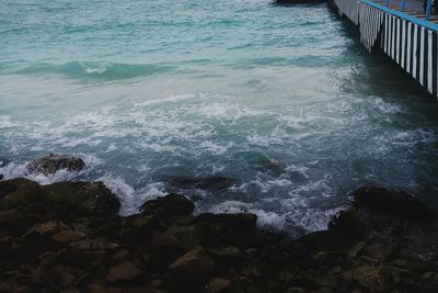 High angle view of rocks in sea