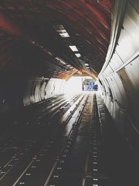 Railroad tracks in tunnel