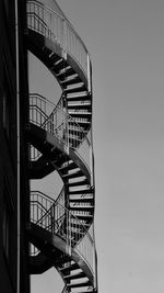 Low angle view of spiral staircase of building