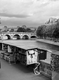 View of bridge in city against sky