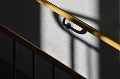 High angle view of railing on staircase