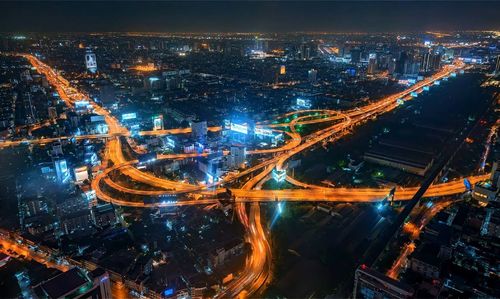 High angle view of illuminated city at night