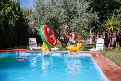 Woman swimming in pool