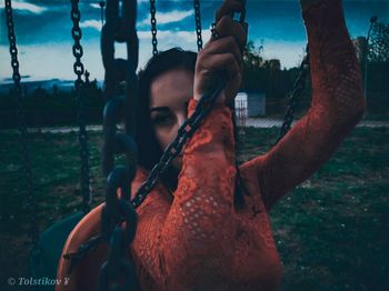 Portrait of man holding playground