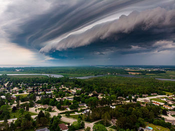 Aerial view of townscape against sky