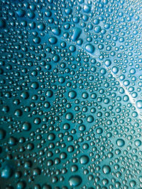 Full frame shot of water drops on glass