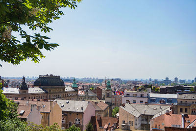 Buildings in city against sky