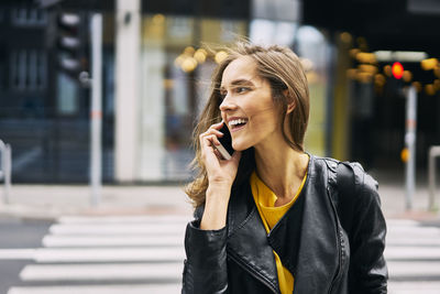 Laughing woman on the phone