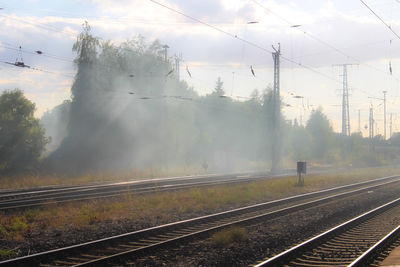 Railroad tracks against sky