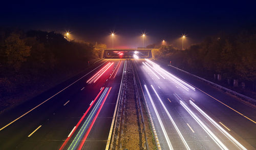 Cars moving on road at night