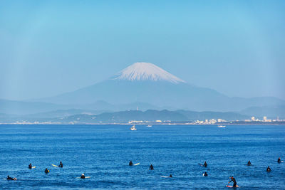 Scenic view of sea against clear blue sky