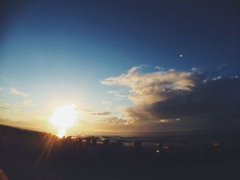 Sun shining through clouds