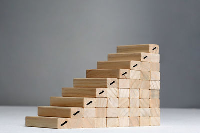 Close-up of stone stack against white background