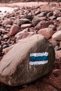 Close-up of heart shape stone on rock