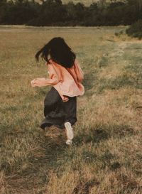 Girl running on field