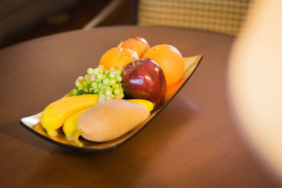 High angle view of fruits in plate on table