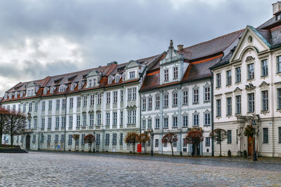 Building against cloudy sky