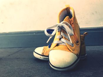 Close-up of shoes on floor