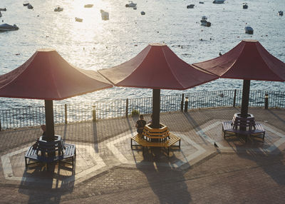 Empty chairs at beach