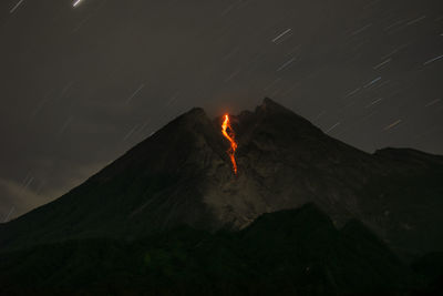 View of volcanic mountain during night