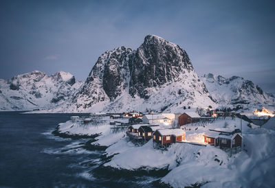 Scenic view of snowcapped mountains against sky during winter