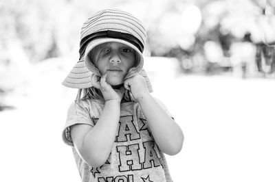 Portrait of cute girl wearing hat