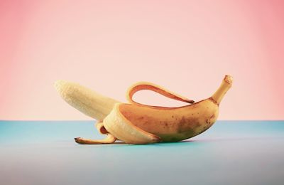 Close-up of bananas against white background