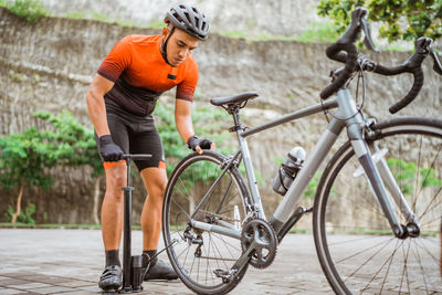 Man riding bicycle on street