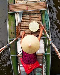 Vietnamese woman cruising the mekong