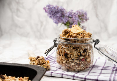 Close-up of ice cream in jar on table