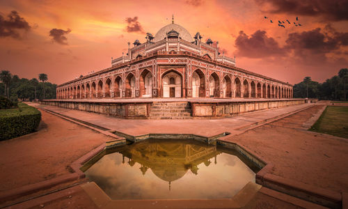 View of historical building against cloudy sky