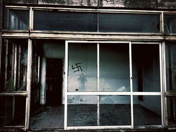 Close-up of window of abandoned building