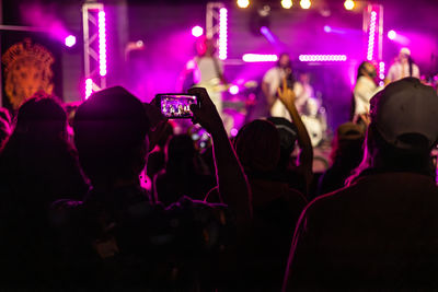Rear view of people at music concert