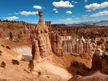 Rock formations on mountain against sky