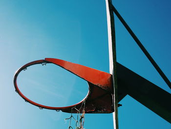 Low angle view of basketball hoop against sky