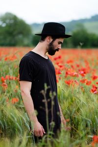 Man relaxing on grassy field