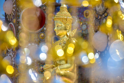 Close-up of illuminated statue