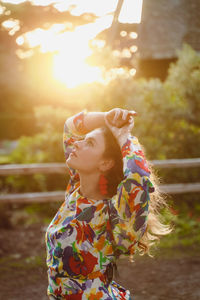 Full length of woman standing outdoors