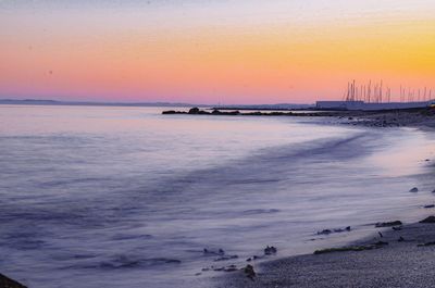 Scenic view of sea against sky during sunset