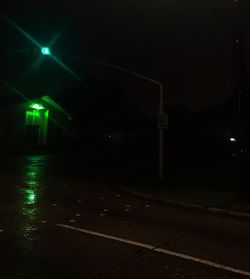 Illuminated road at night