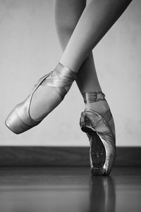 Low section of ballet dancer performing in studio