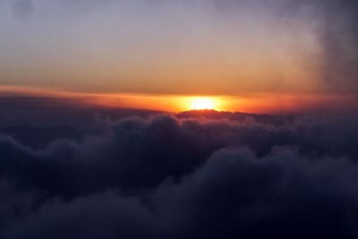 Scenic view of dramatic sky during sunset