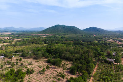 Scenic view of landscape and mountains against sky