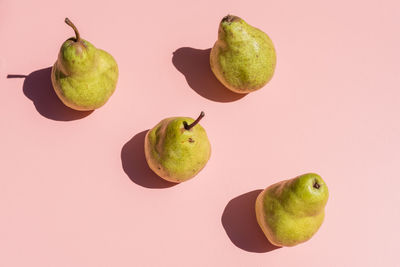 Close-up of apple against green background