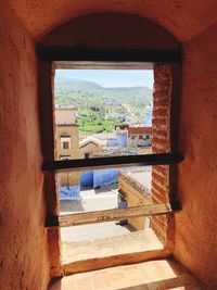 Buildings seen through window