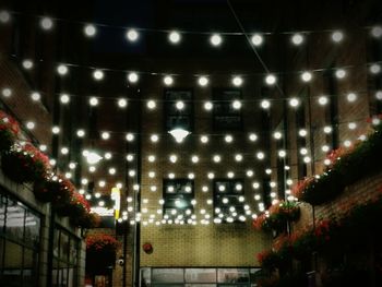 Low angle view of illuminated lights