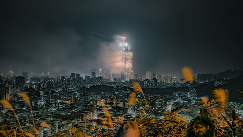 Illuminated cityscape at night