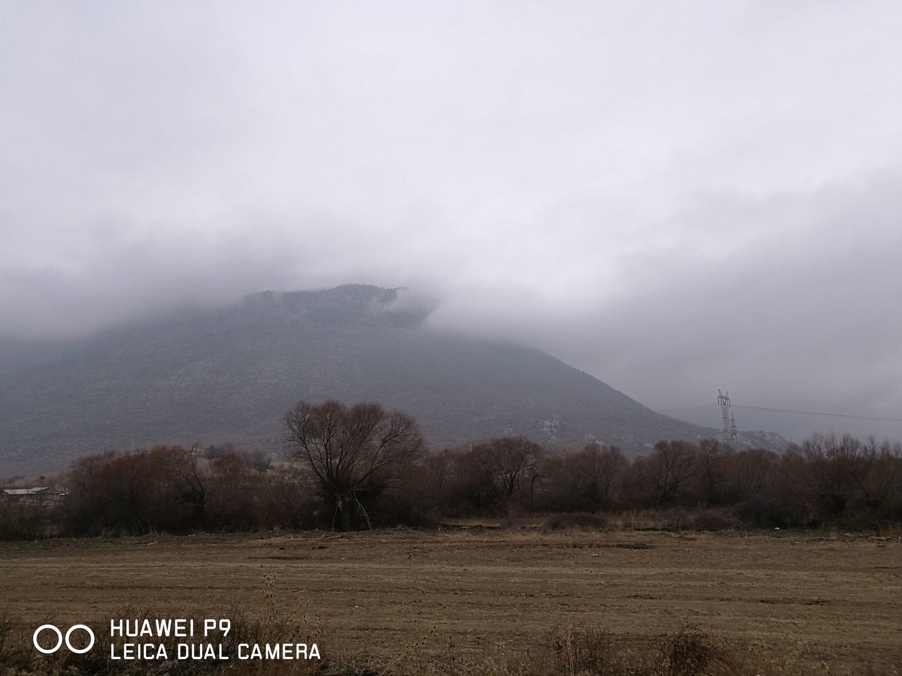 nature, sky, scenics, beauty in nature, tranquil scene, tranquility, no people, outdoors, mountain, field, cloud - sky, landscape, tree, fog, day, technology