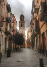 Narrow street leading towards church