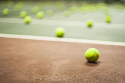 Close-up of yellow ball on table